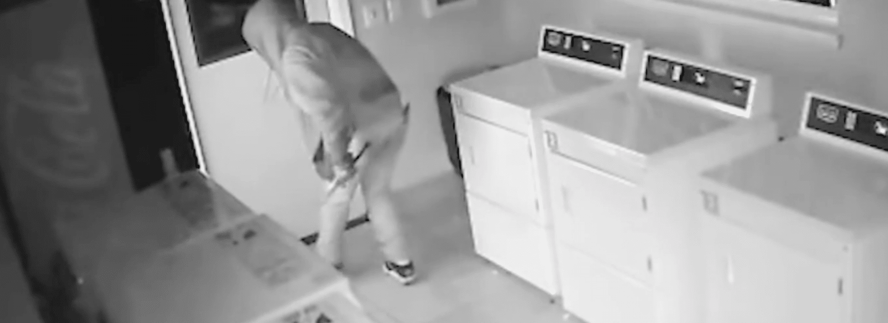 Thief With Crowbar in Apartment Laundry Room