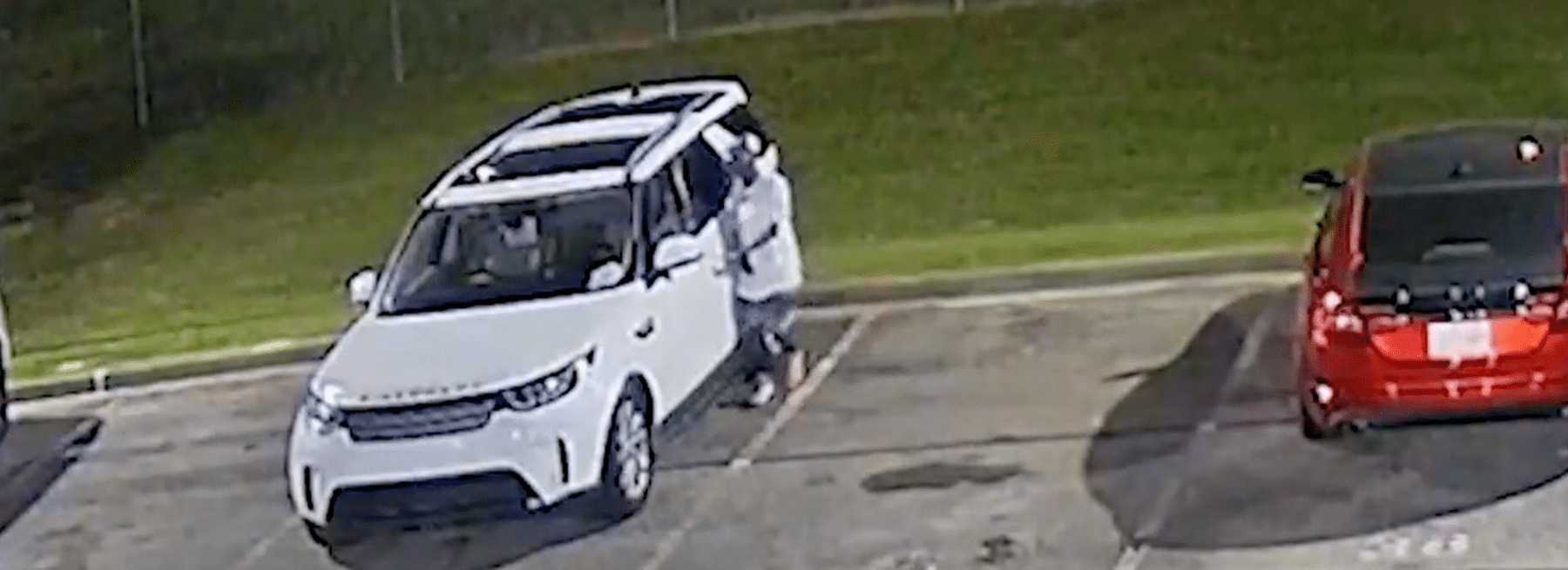 Person breaking into vehicle at Tennessee auto dealership