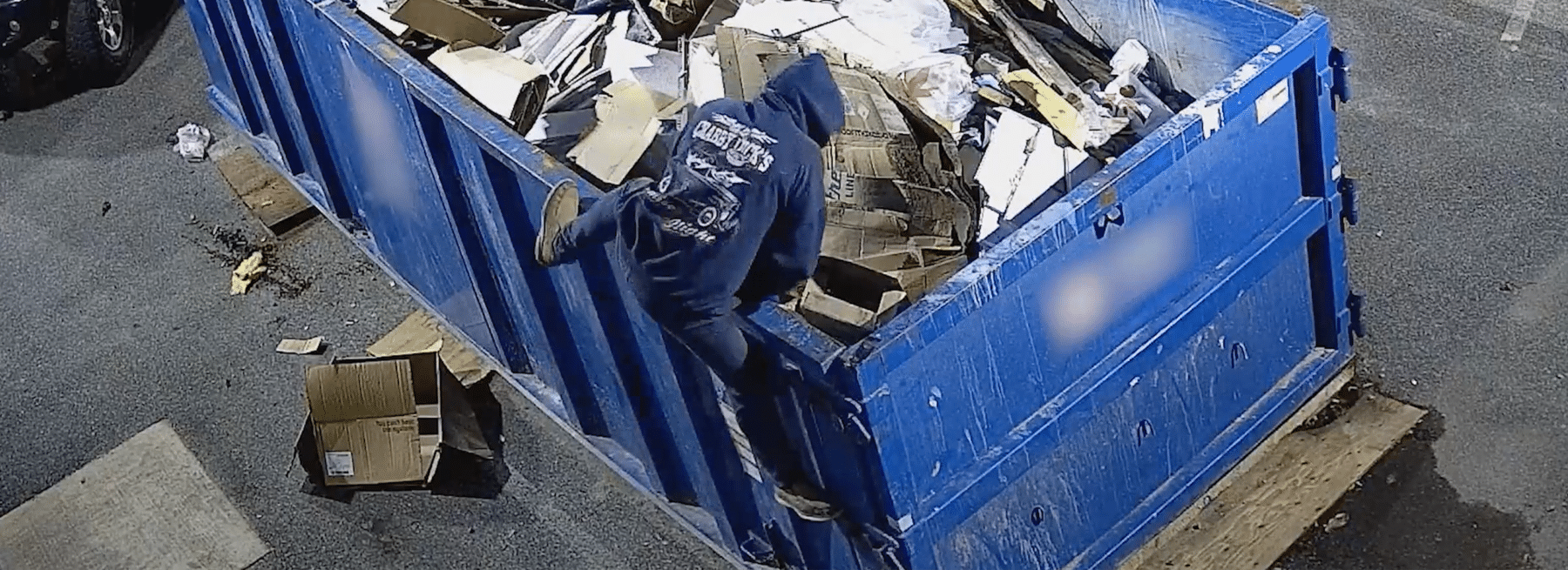 dumpster diver at Maryland auto dealership