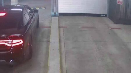 Car Tailgating into Parking Garage Hero scaled 1