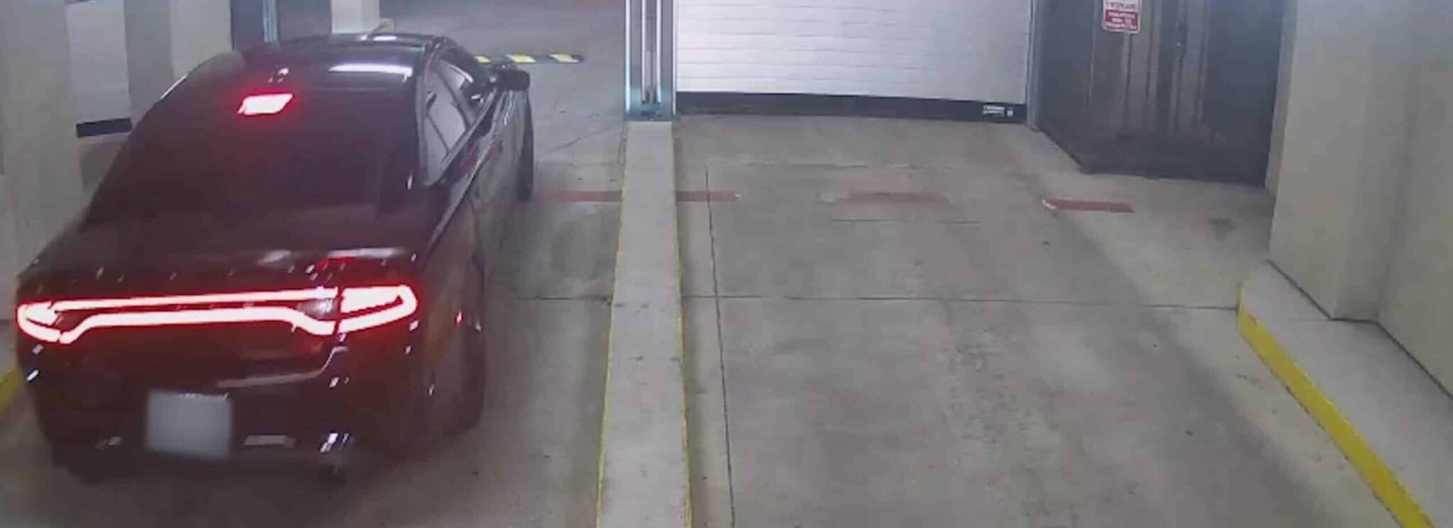 Car Tailgating into Parking Garage Hero scaled 1