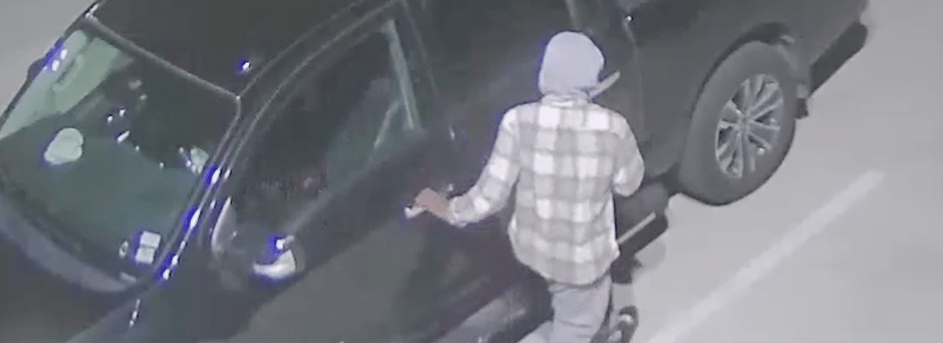 Car Thief Hides out Under Vehicle in Parking Garage Hero