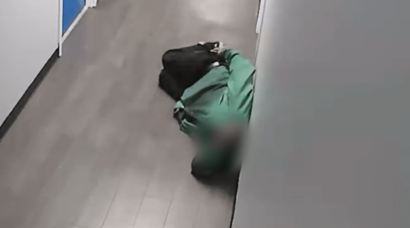 Caught on Surveillance Apparent Intoxicated Individual Passes Out in Apartment Community Hallway Hero