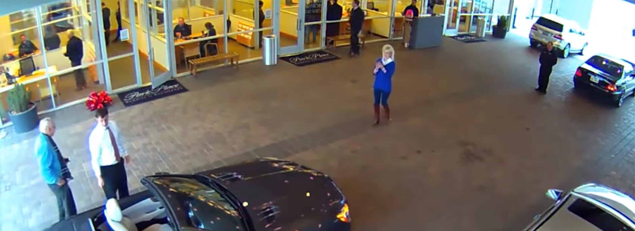 Couple Inspecting Mercedes Car Dealership Security hero scaled 1