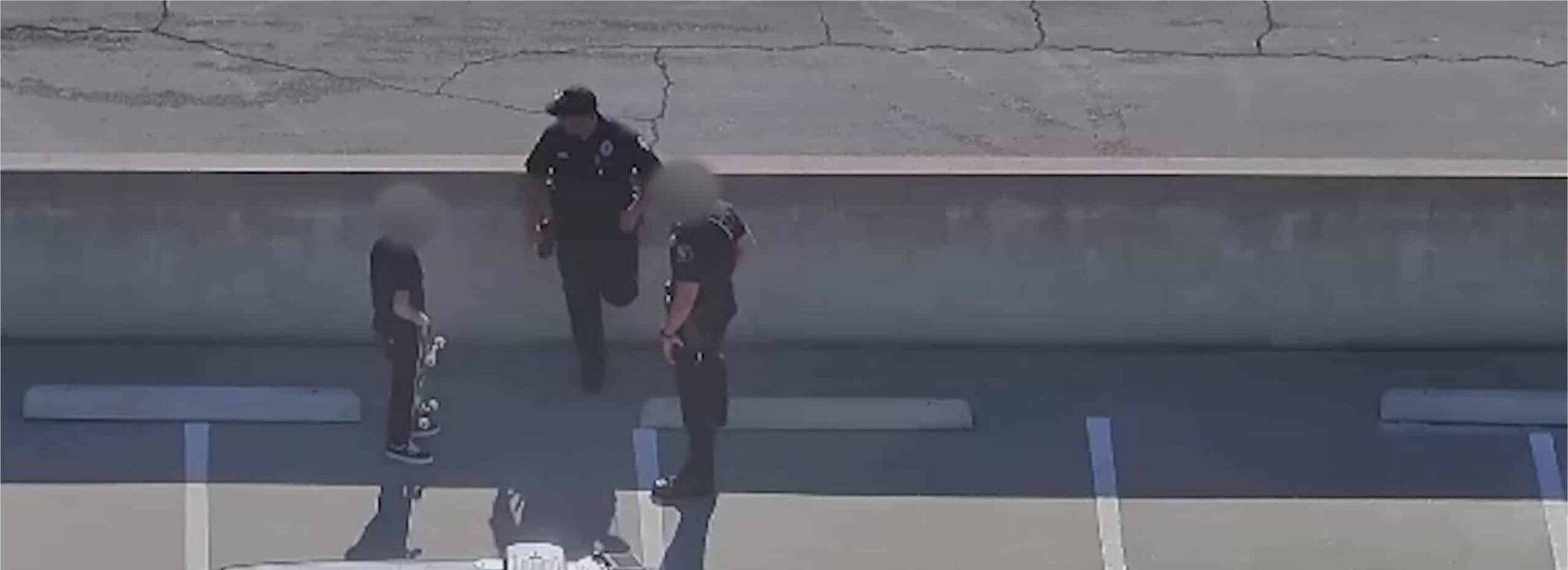 Parking Lot Skateboarder is Potential Liability Hero scaled 1