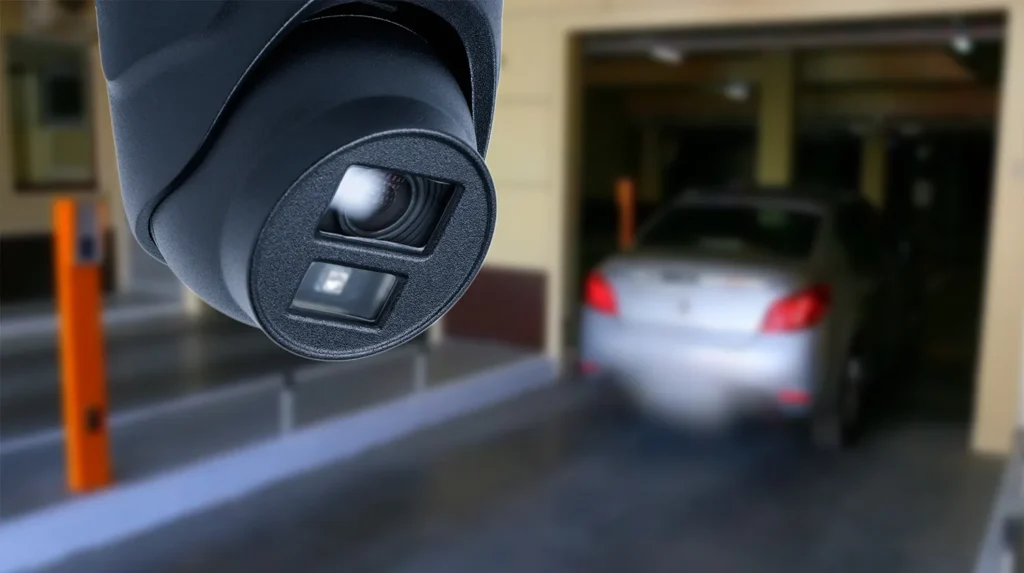 A license plate reader and a vehicle in a parking garage 