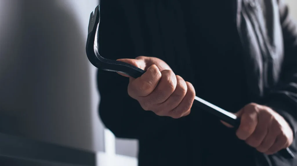 Man holding a crowbar